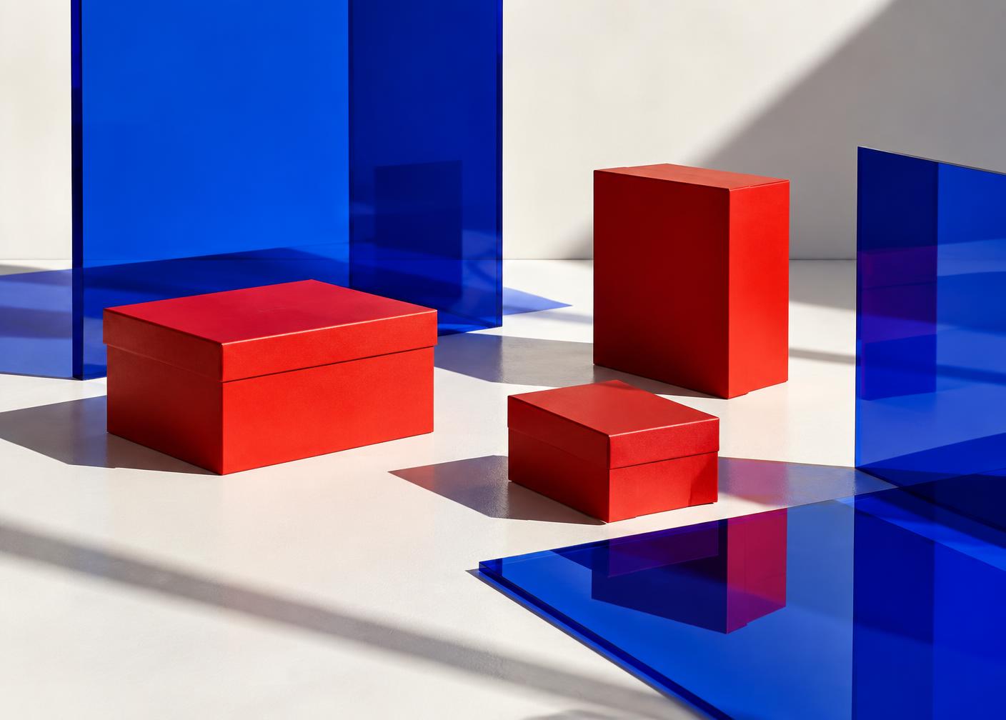 Red product boxes among cobalt glass panels